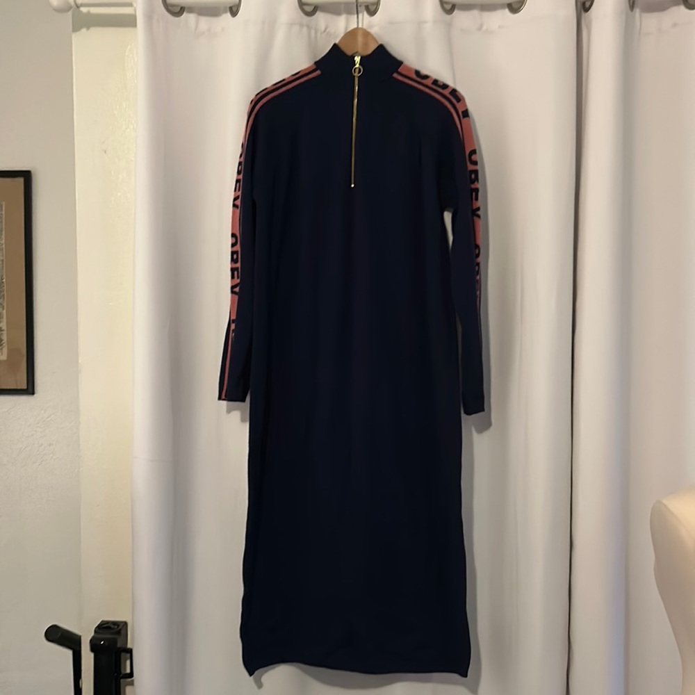 As new oversized long knitted Obey dress w zipper and pink stripes on sleeves